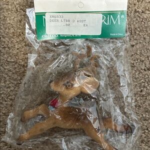 Vintage 1980’s flocked reindeer Christmas ornament new in original package